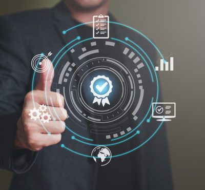 Businessman show thumbs up with icon that show top service quality standard in business or industrial ISO certification. Quality assurance formal concept in organization.